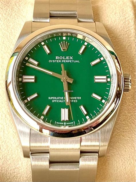 rolex oyster perpetual green face.